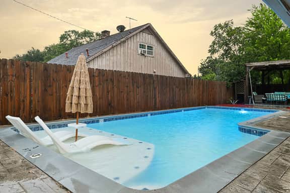 Home for summer with pool, pool table, outdoor kitchen,patio and balcony